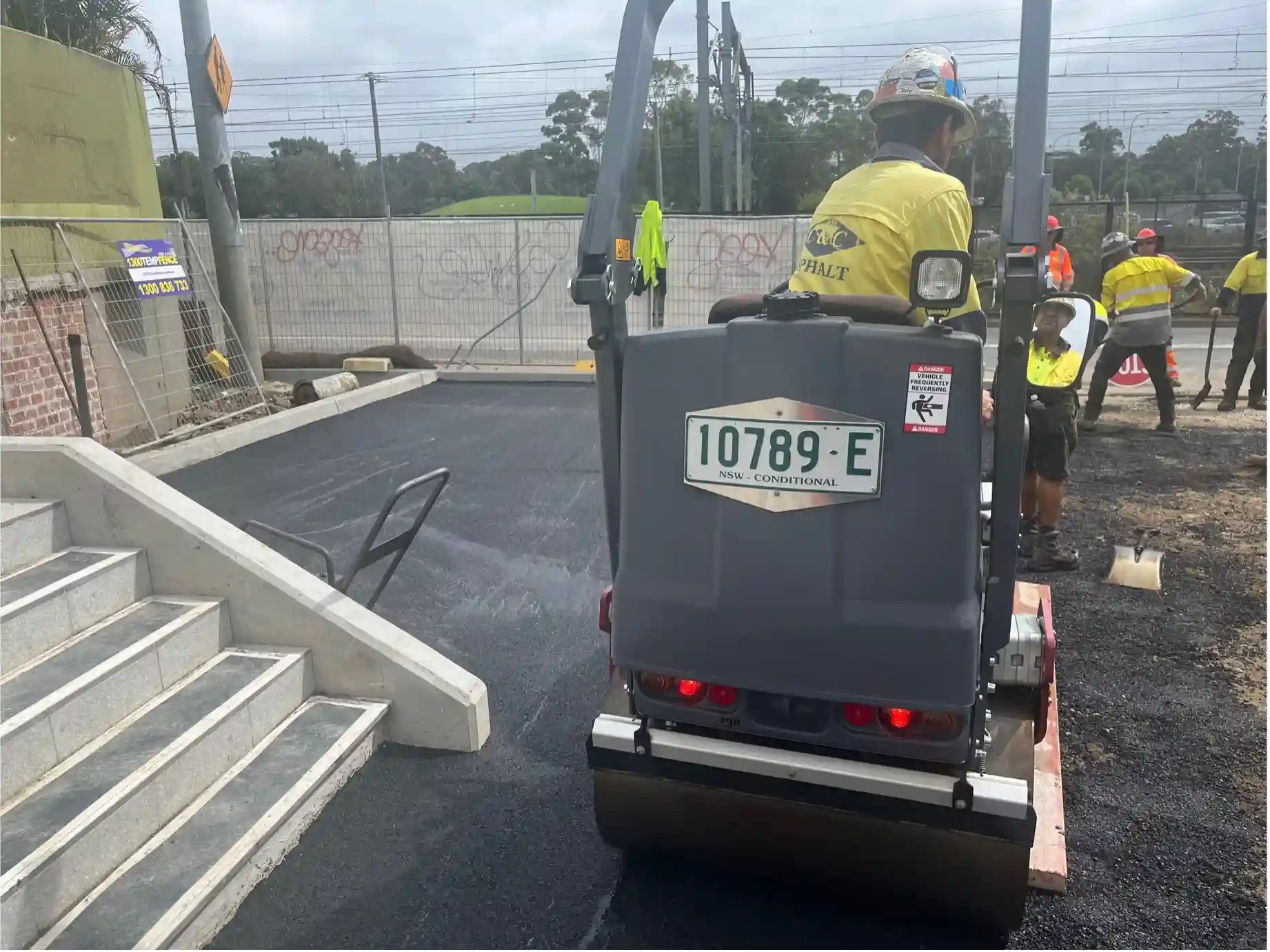 Workers developing the McCredie Hotel carpark in Seven Hills, NSW
