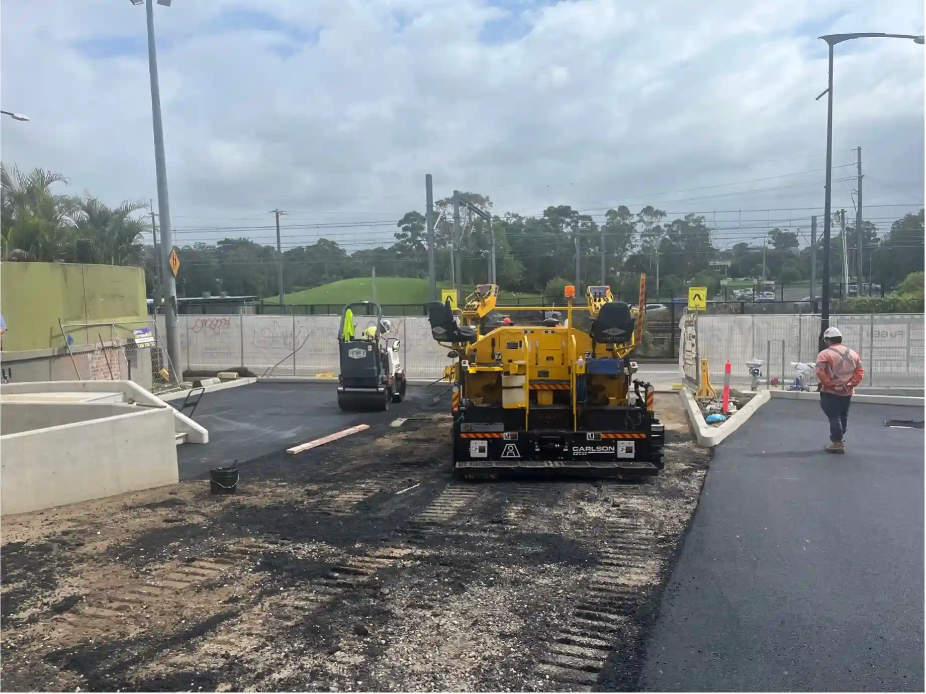 Workers developing the McCredie Hotel carpark in Seven Hills, NSW