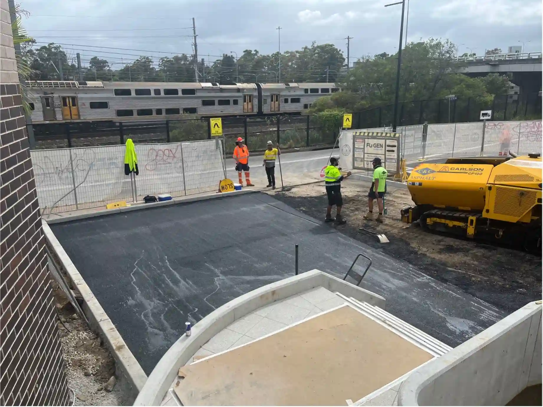 Workers developing the McCredie Hotel carpark in Seven Hills, NSW